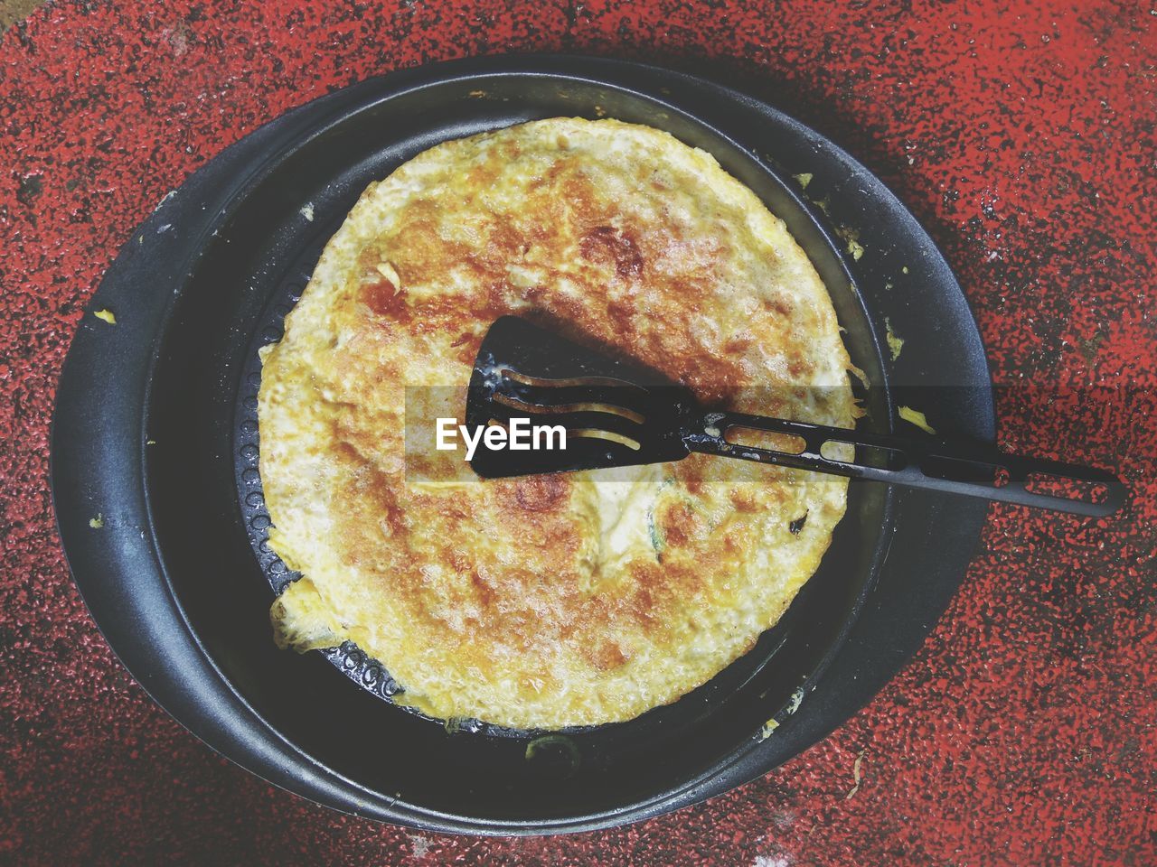High angle view of omelet in frying pan