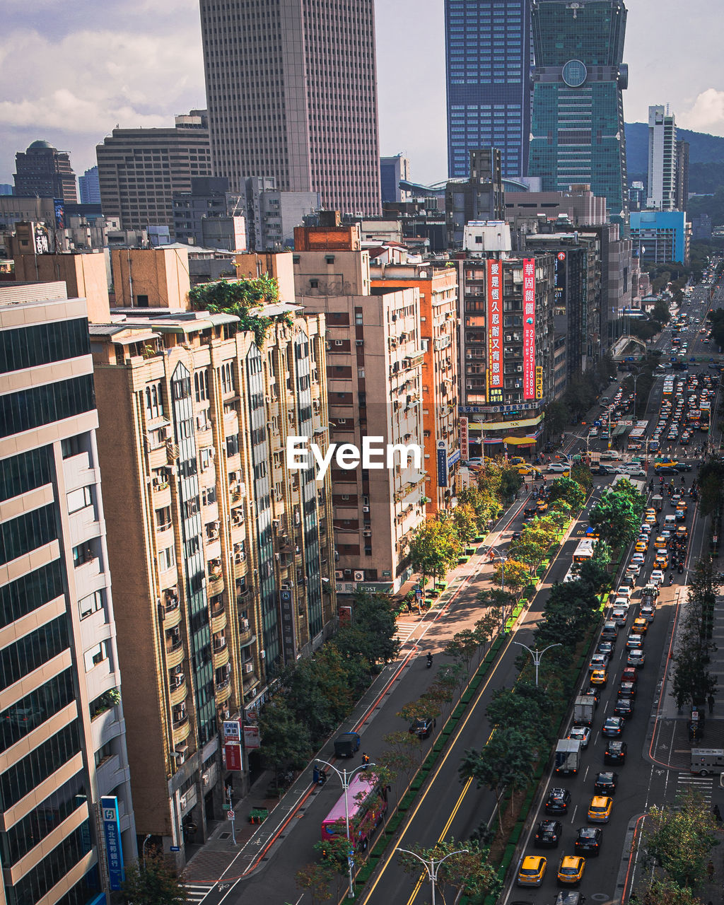 HIGH ANGLE VIEW OF CITY BUILDINGS AGAINST SKY