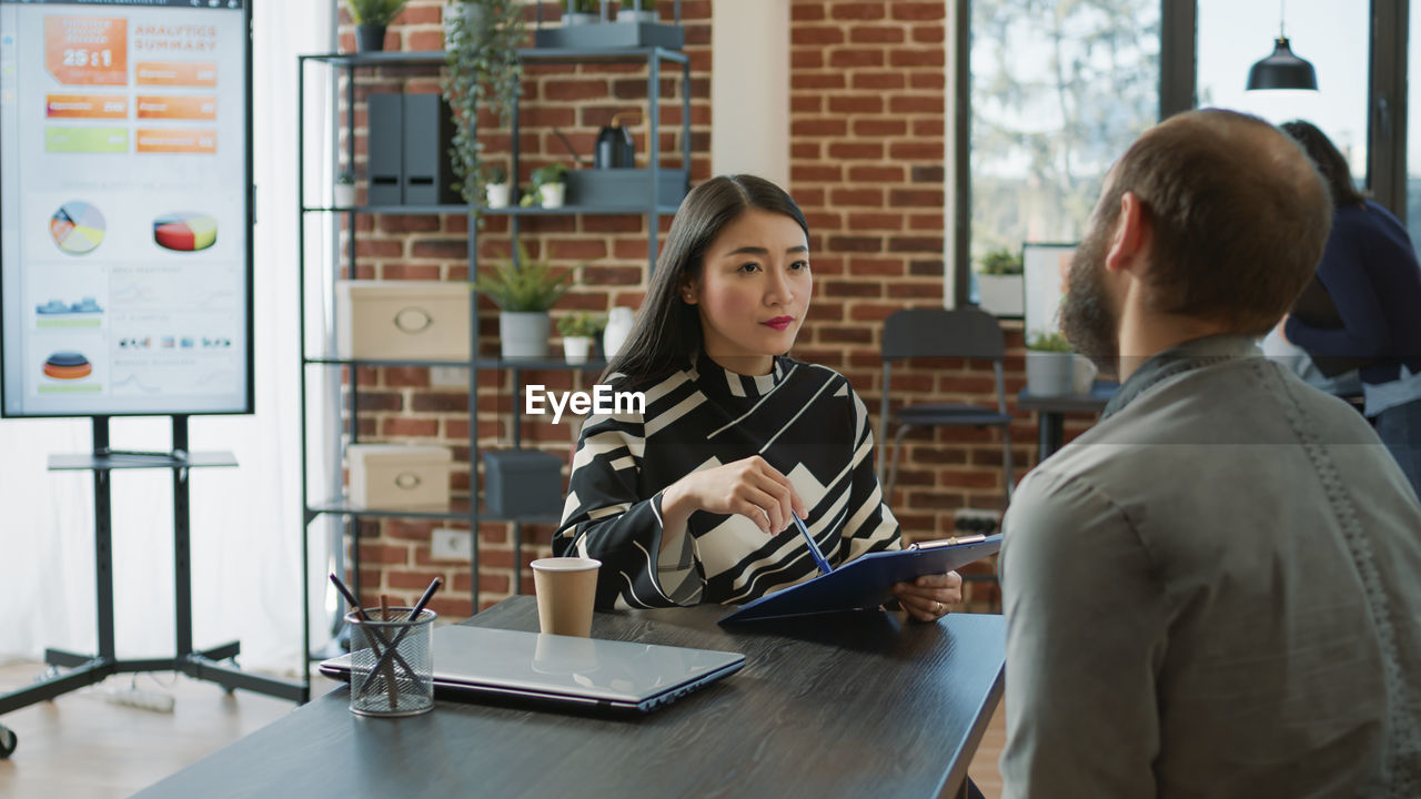 Candidate giving interview in office