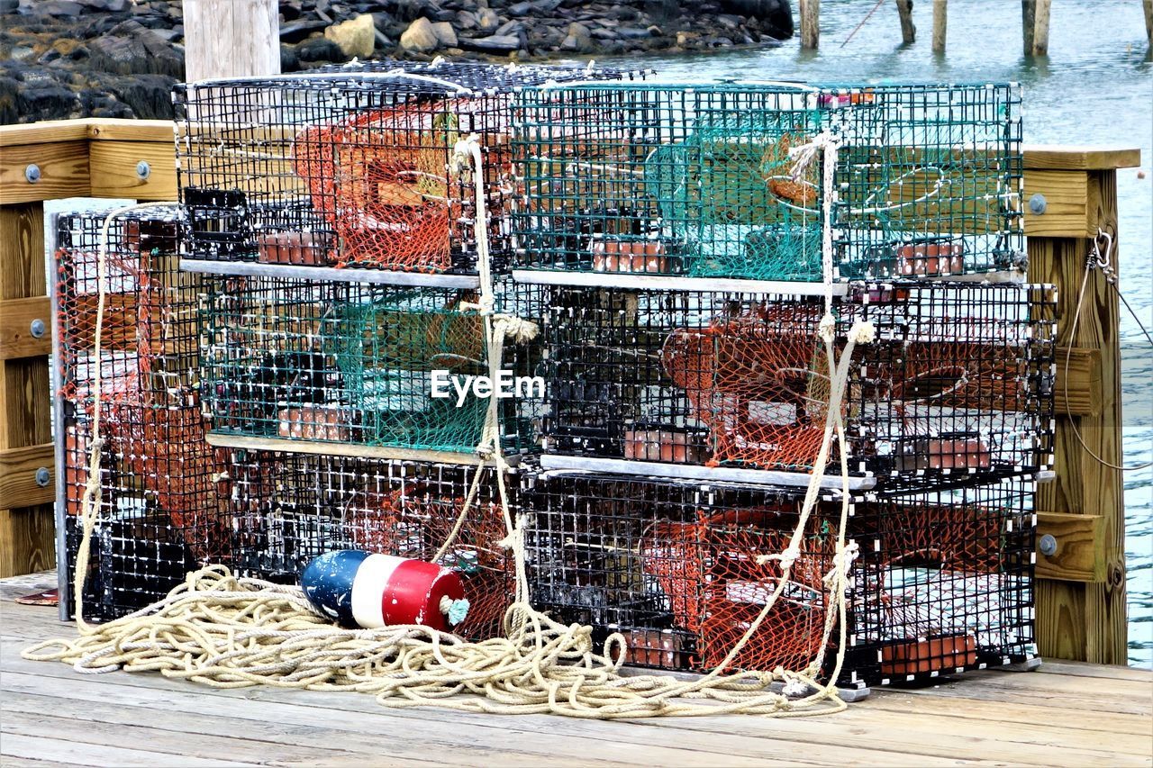 Fishing nets with ropes at harbor