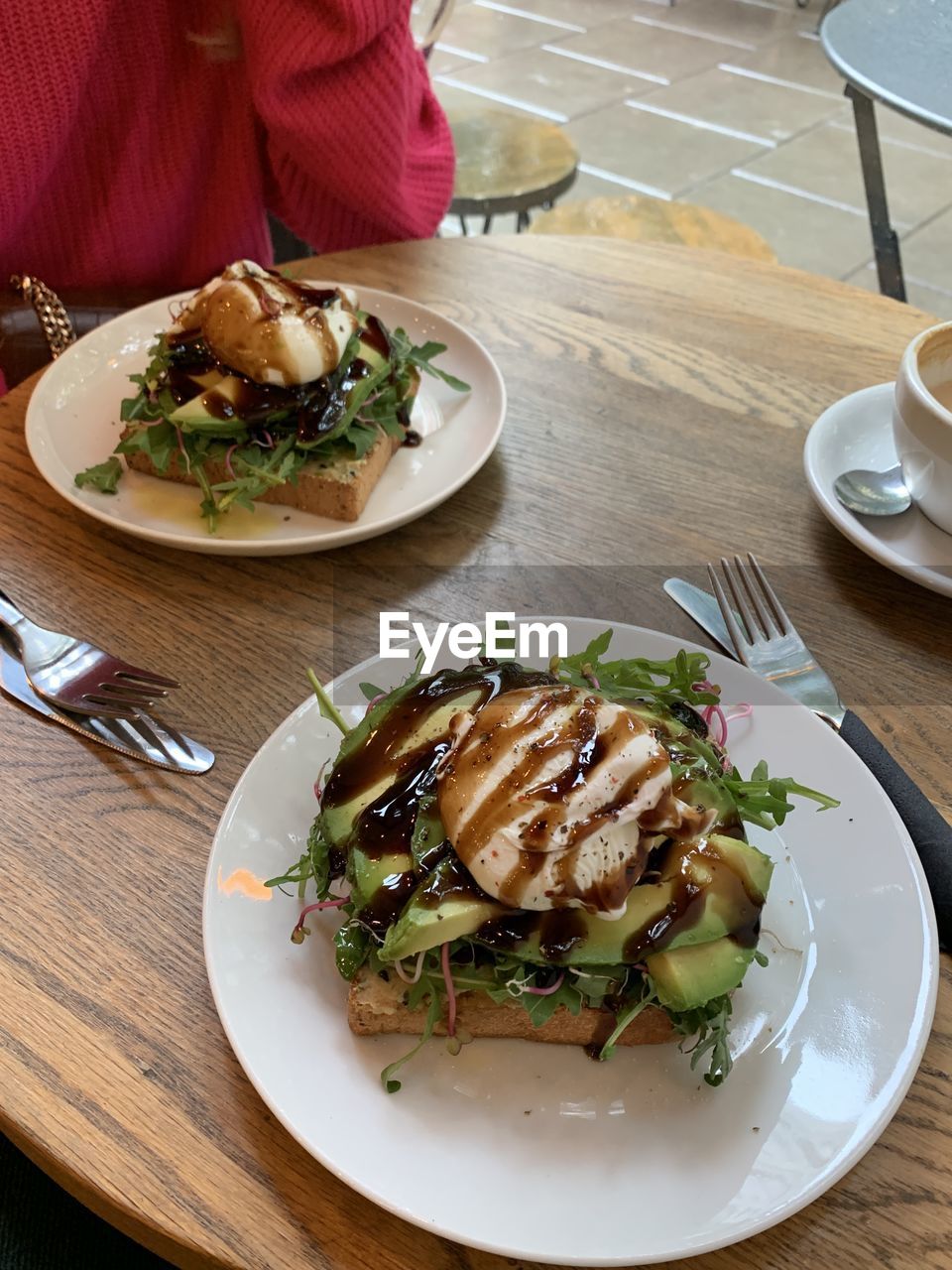 food and drink, food, table, healthy eating, dish, freshness, plate, high angle view, produce, wellbeing, eating utensil, vegetable, fork, indoors, meal, kitchen utensil, wood, no people, restaurant, cuisine, lunch, meat, herb, household equipment, still life, serving size, dinner