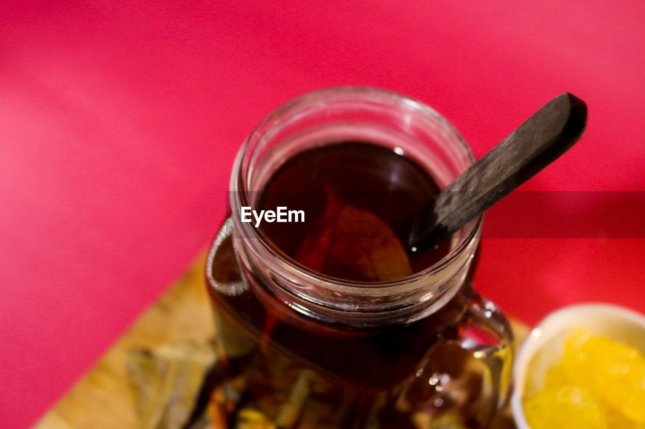 HIGH ANGLE VIEW OF ICE CREAM IN JAR ON TABLE