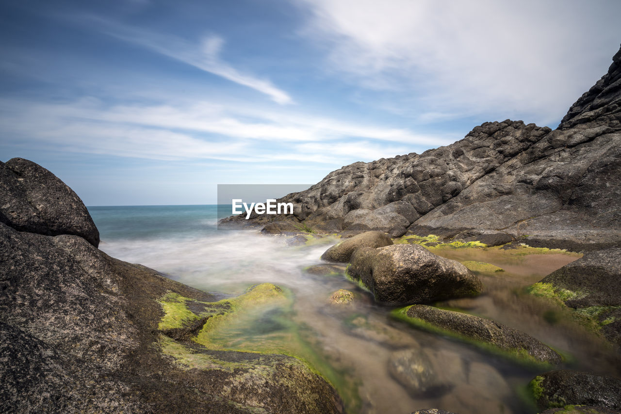 Scenic view of rocky shore