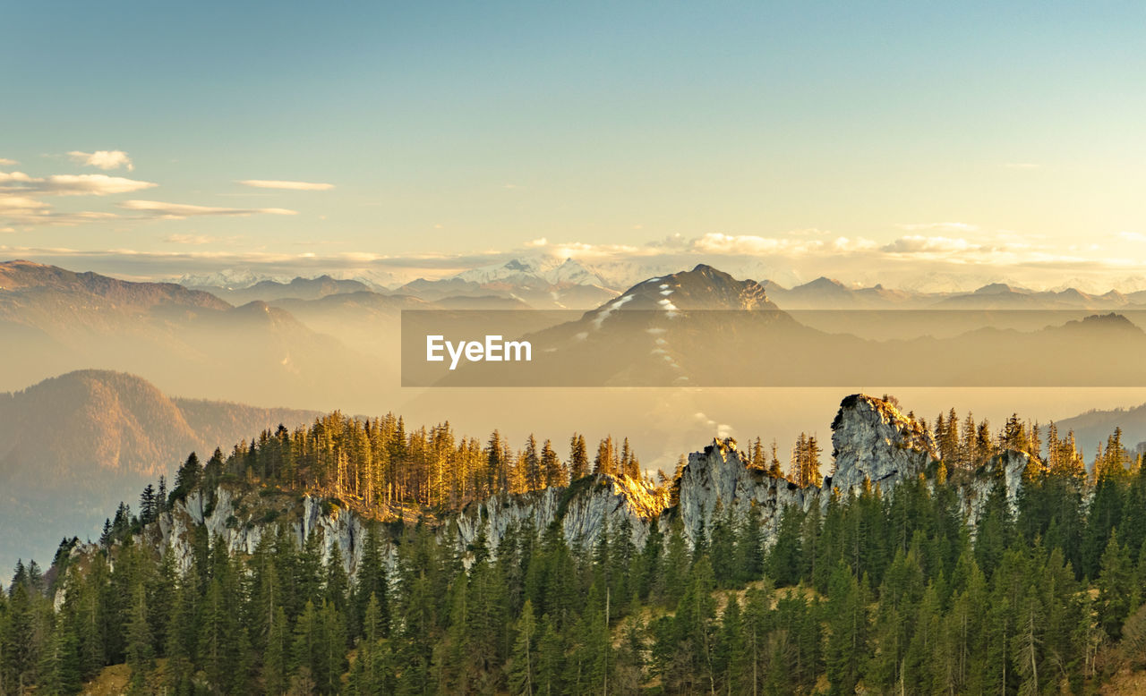 Scenic view of mountains against sky during sunset