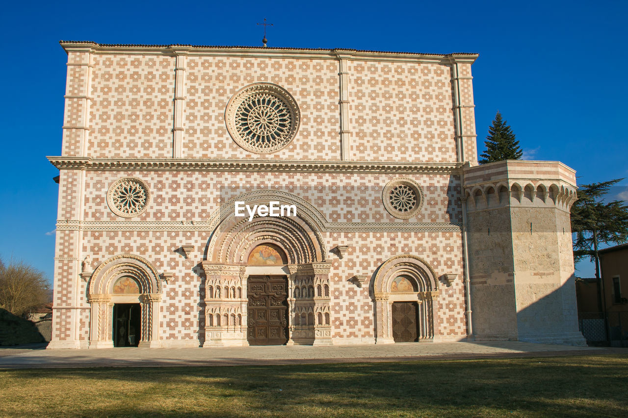 Facade of  basilica of santa maria di collemaggio in l'aquila restored after the earthquake of 2009