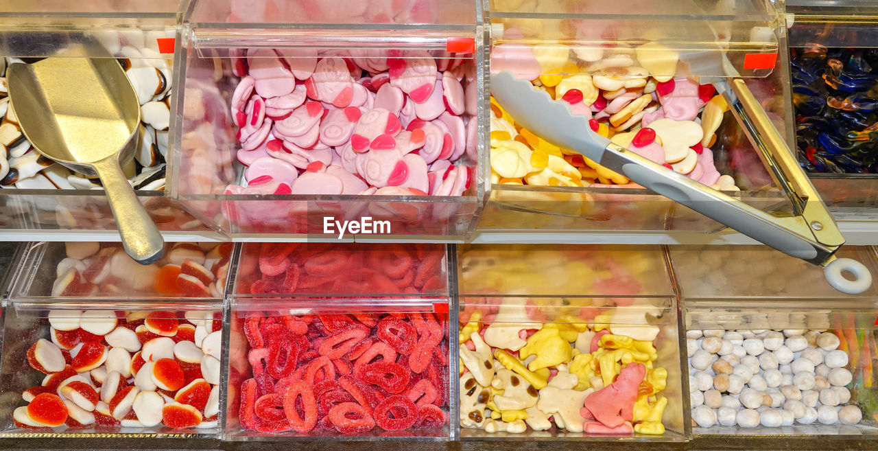 High angle view of various candies on display at store