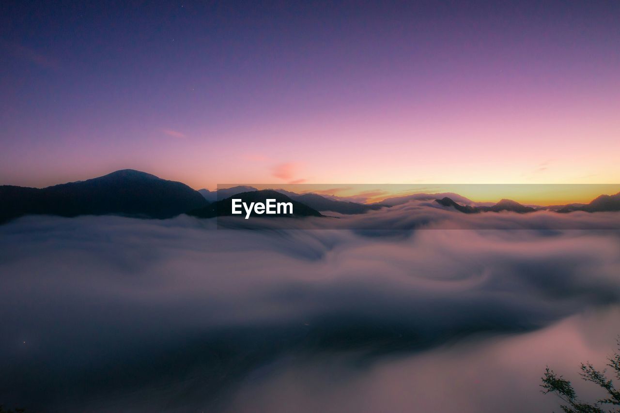 Scenic view of dramatic sky during sunset