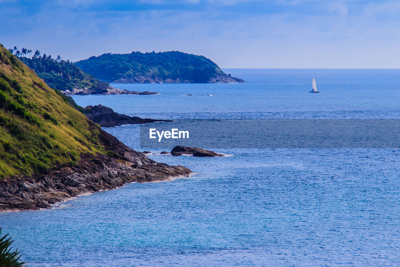 Scenic view of sea against blue sky