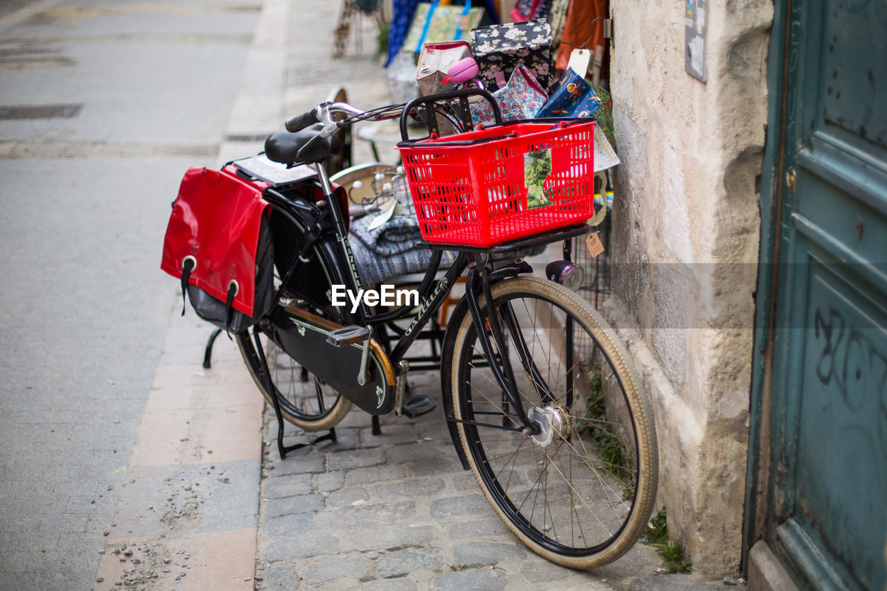 High angle view of bicycle parked by building