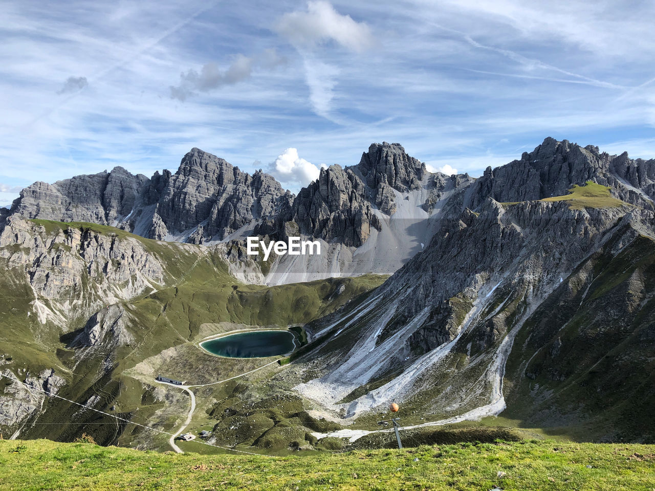 Scenic view of landscape and mountains against sky