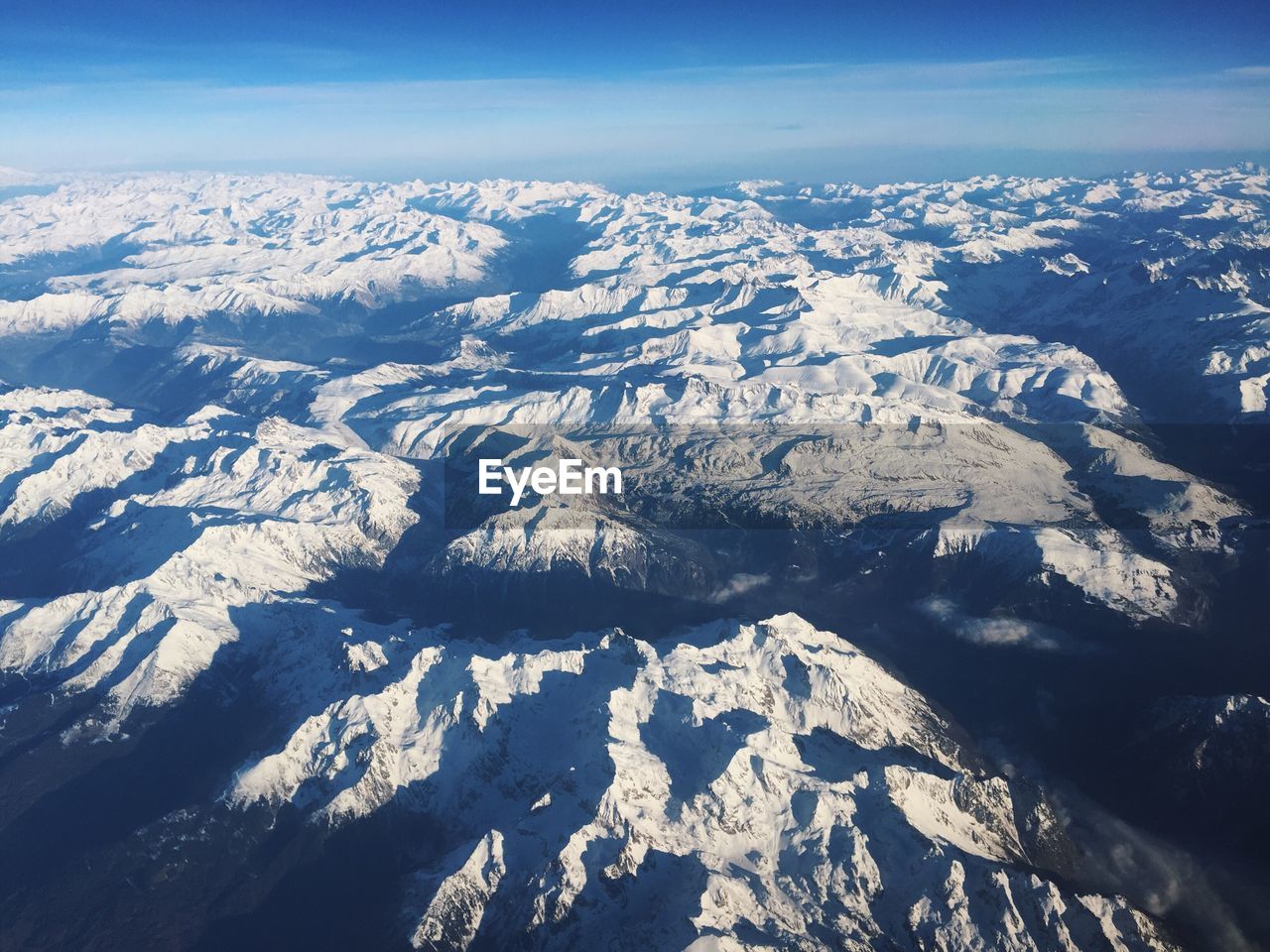 Snowy mountains from a high altitude