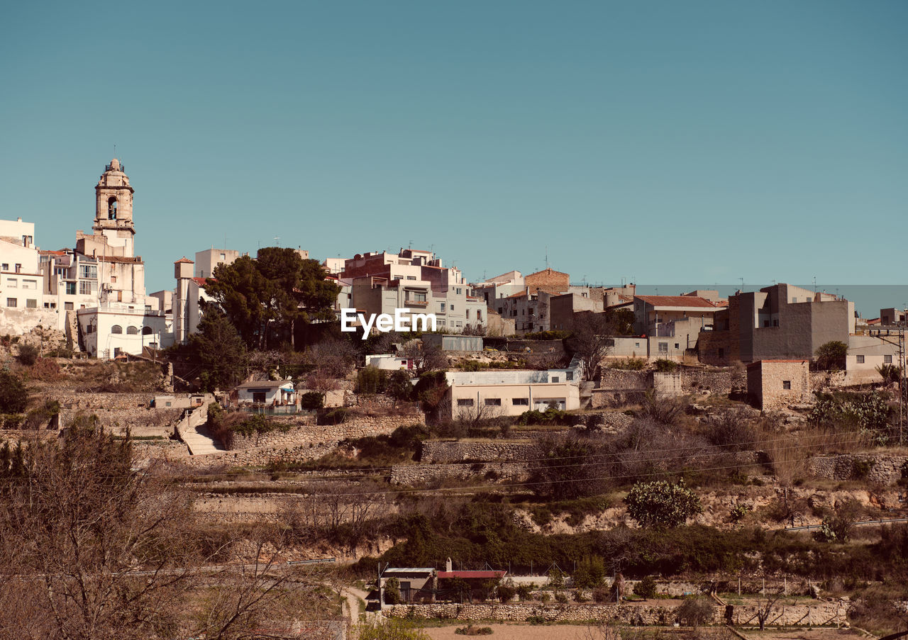 Cityscape against clear sky