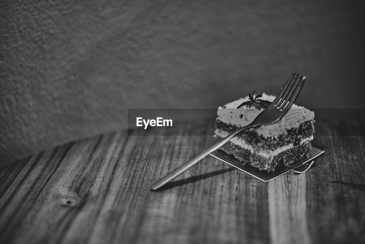 HIGH ANGLE VIEW OF CHOCOLATE ON TABLE