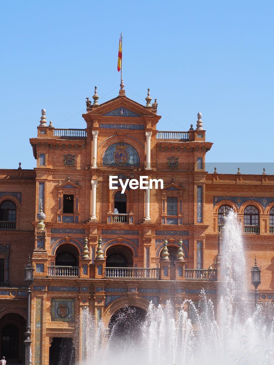 VIEW OF FOUNTAIN AGAINST BUILDING