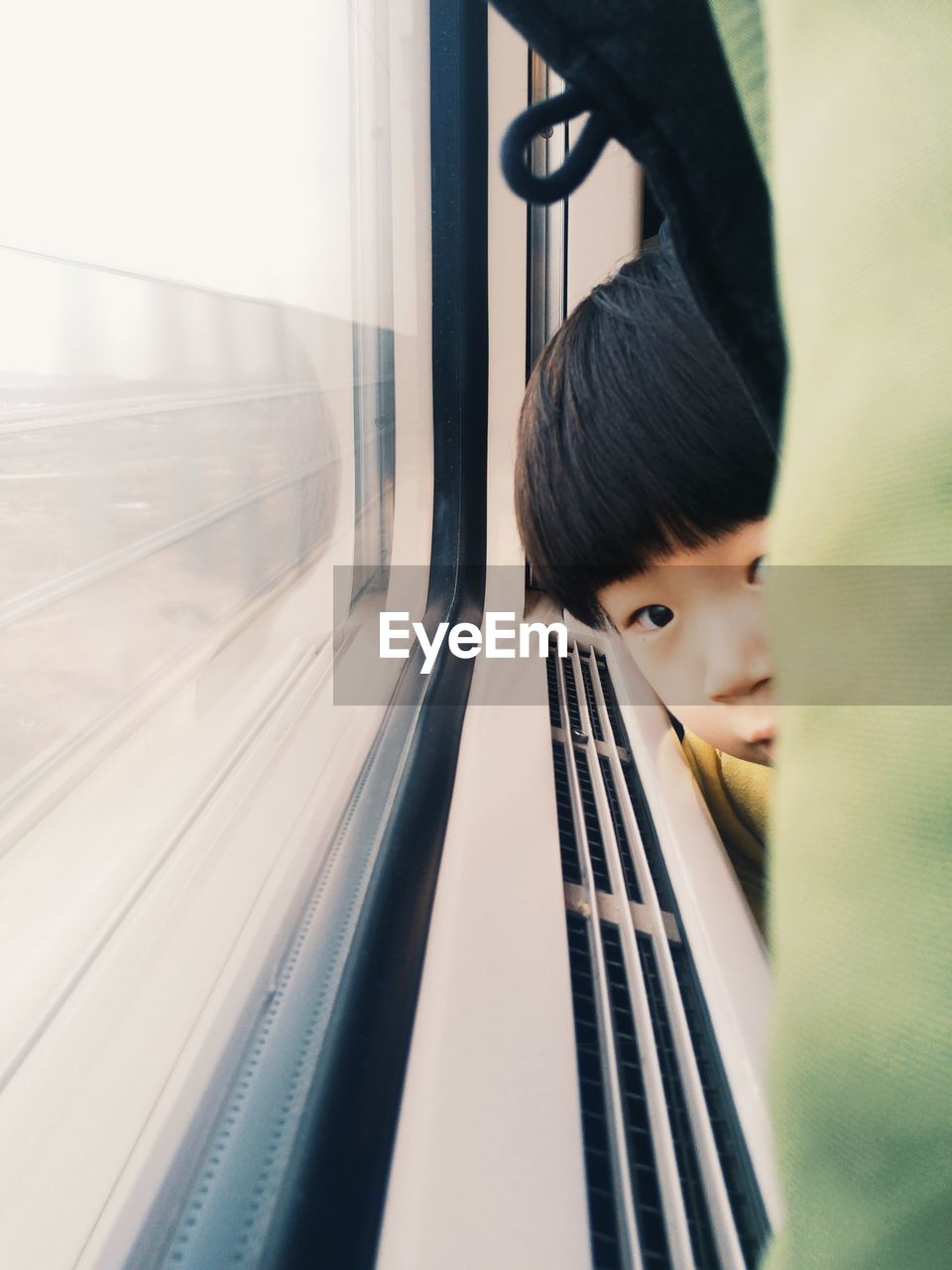 Portrait of child traveling in train