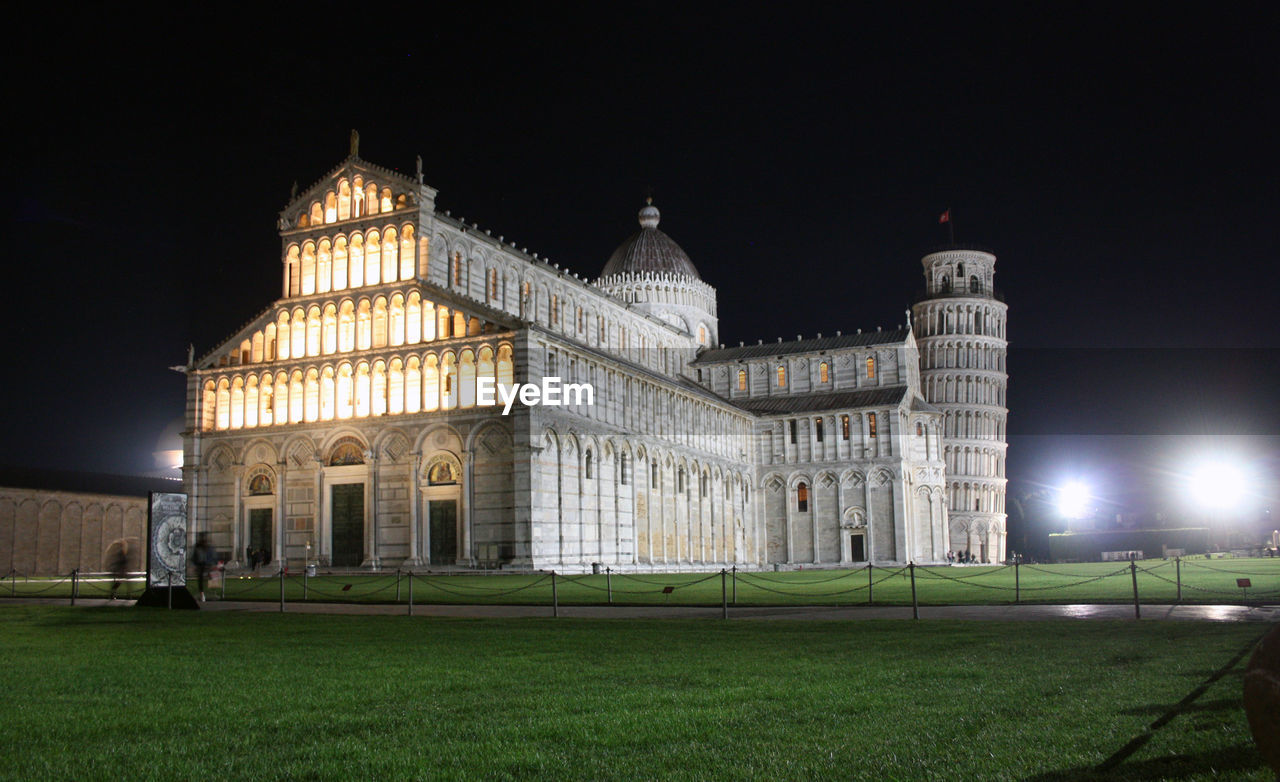 Piazza miracoli in pisa at night monuments the tower and solitude of global pandemic in tuscany