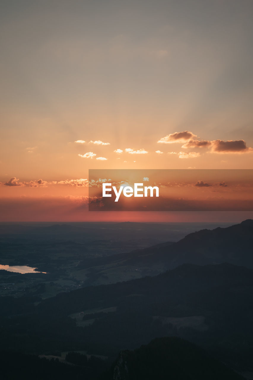 Scenic view of allgäu against sky during sunrise