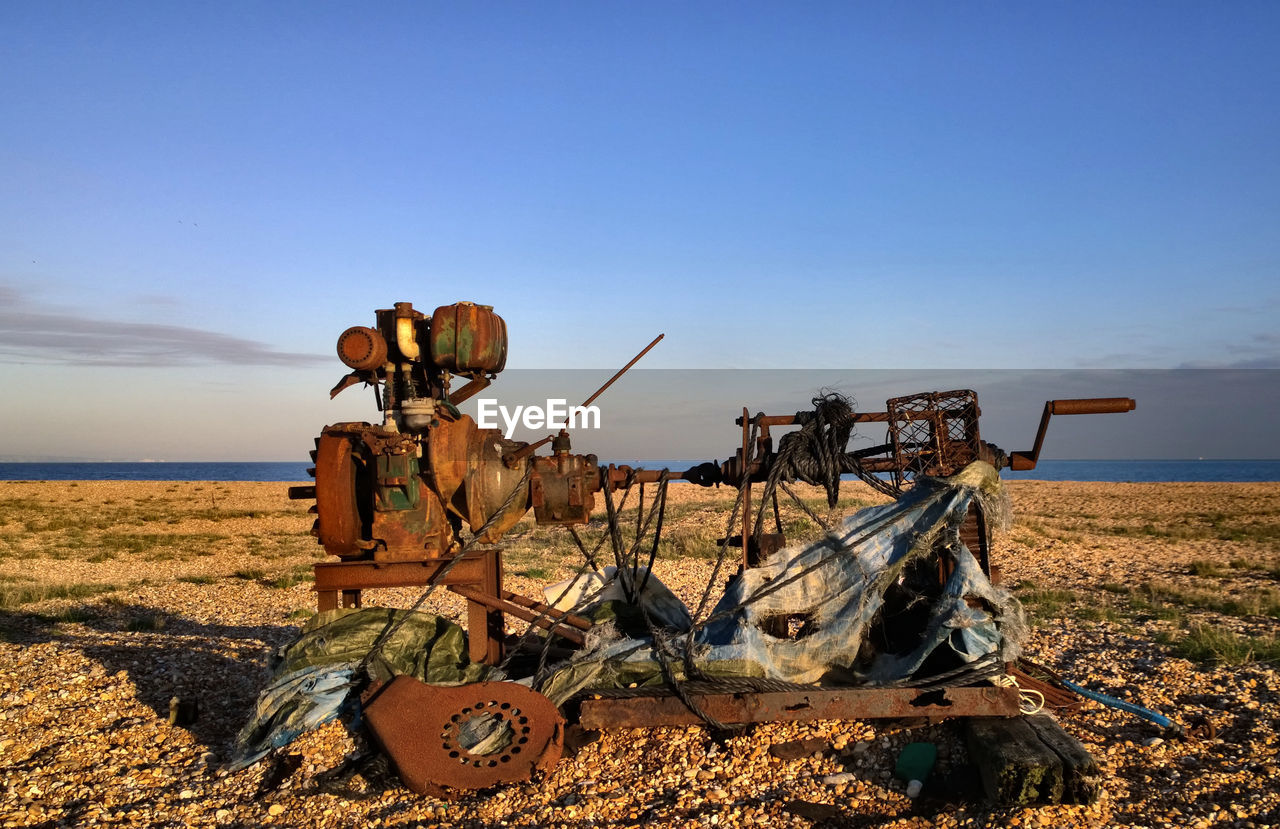 Rusting machinery on the beach