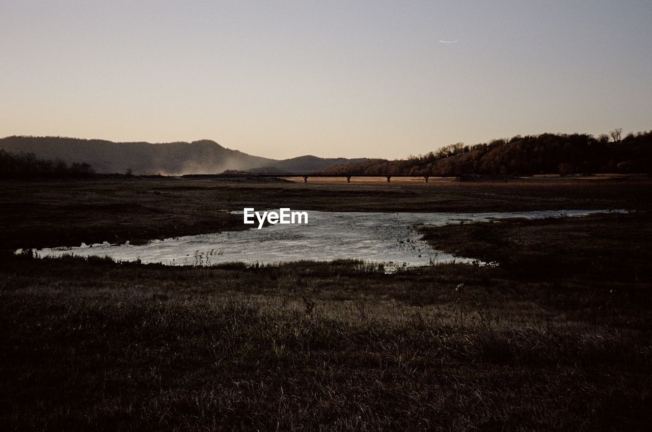 Scenic view of lake against clear sky