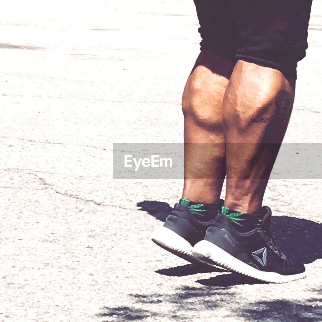 LOW SECTION OF MAN ON STREET