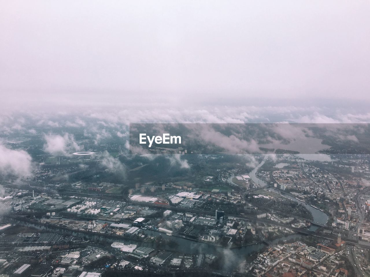 Aerial view of cityscape against sky