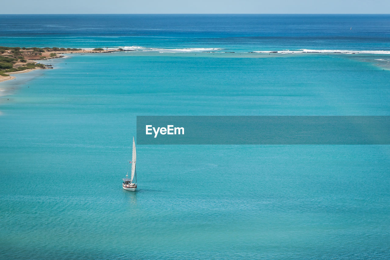 High angle view of sailboat sailing on sea