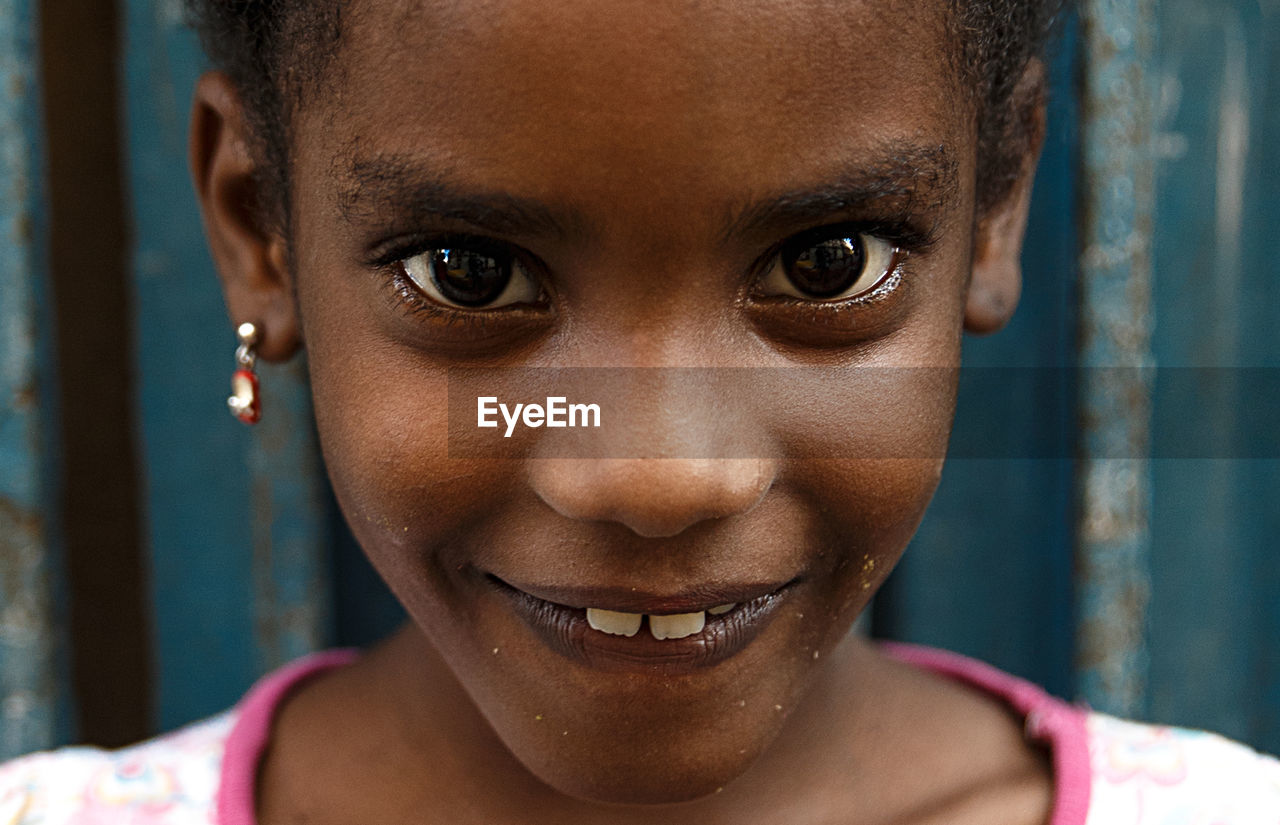 Close-up portrait of smiling girl