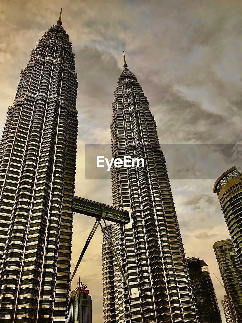 low angle view of modern buildings against sky during sunset