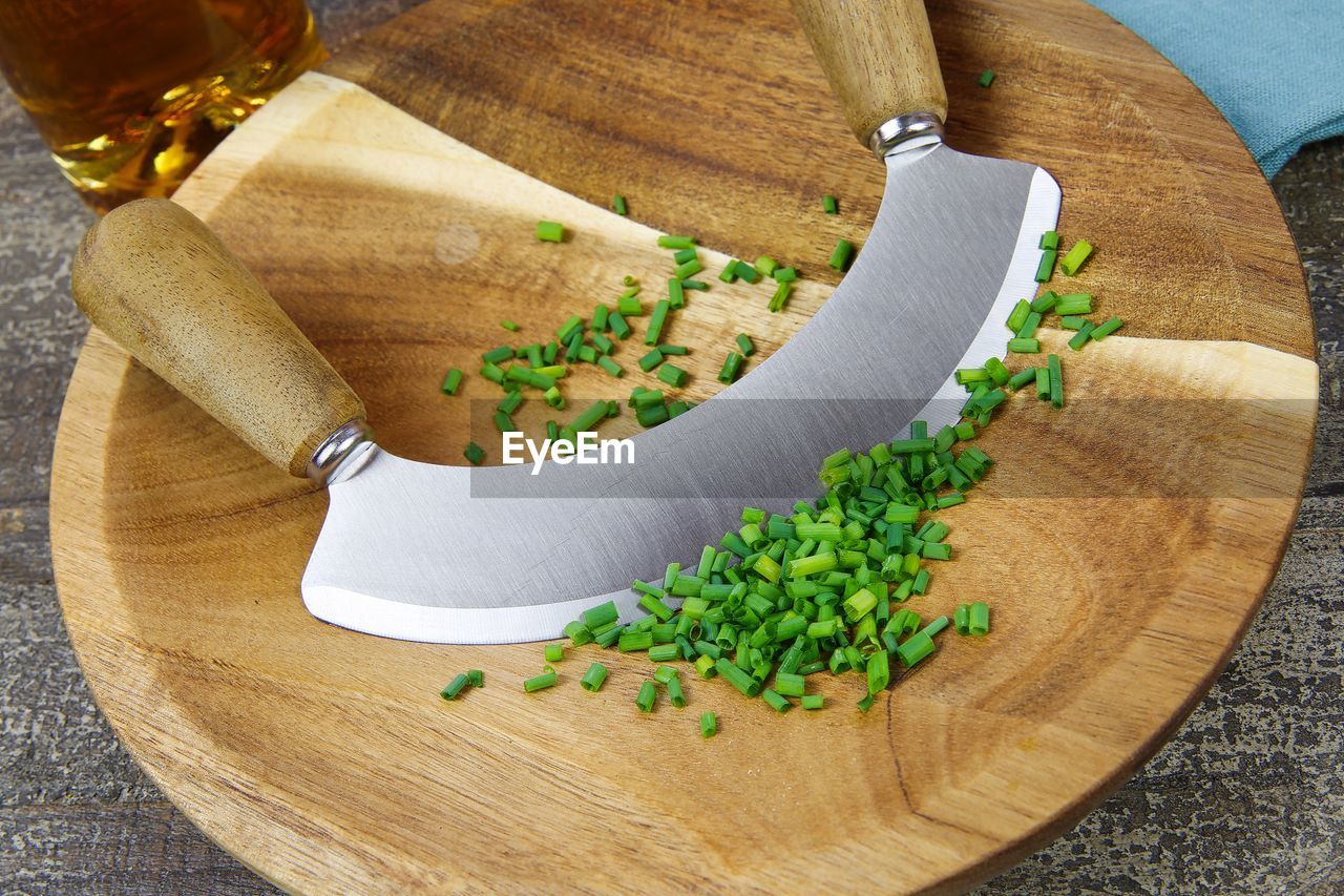 HIGH ANGLE VIEW OF VEGETABLES IN CONTAINER ON TABLE