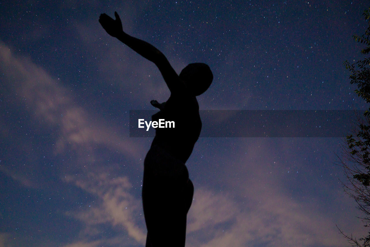 SILHOUETTE GIRL AGAINST SKY AT NIGHT