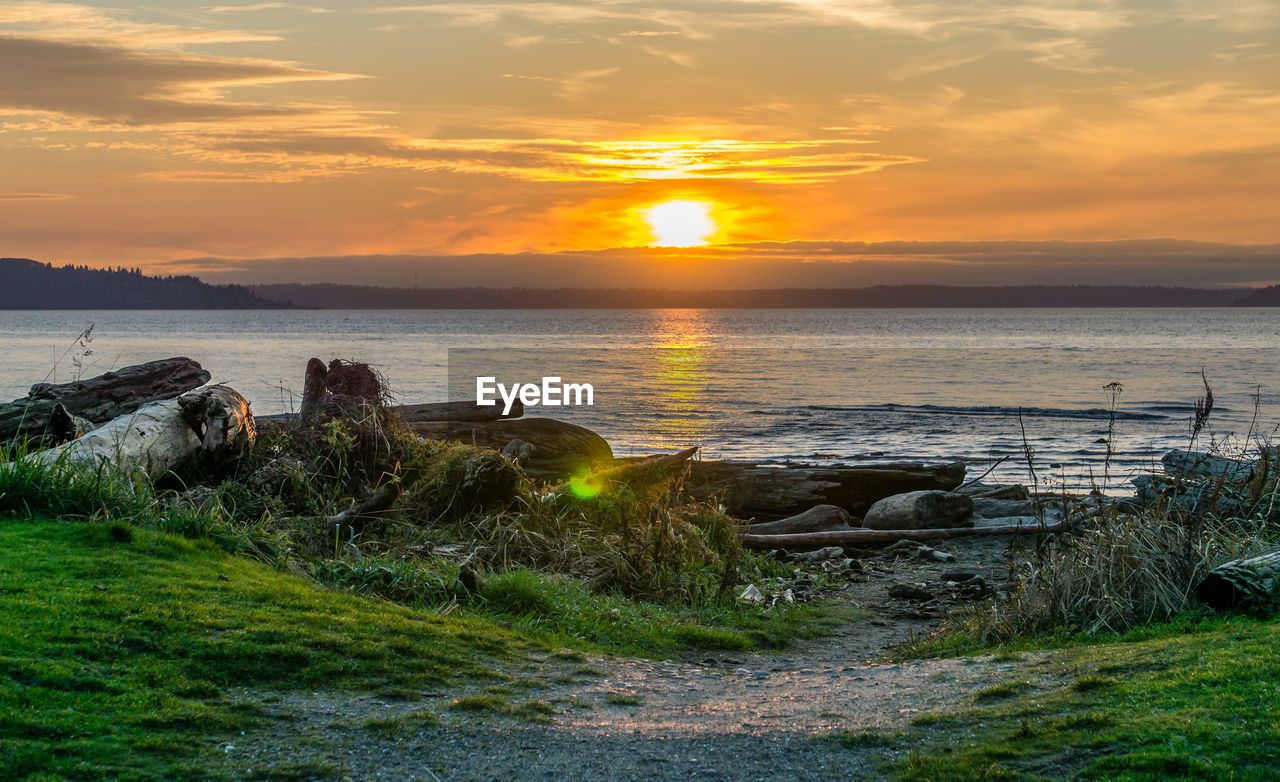 Scenic view of sea against sky during sunset