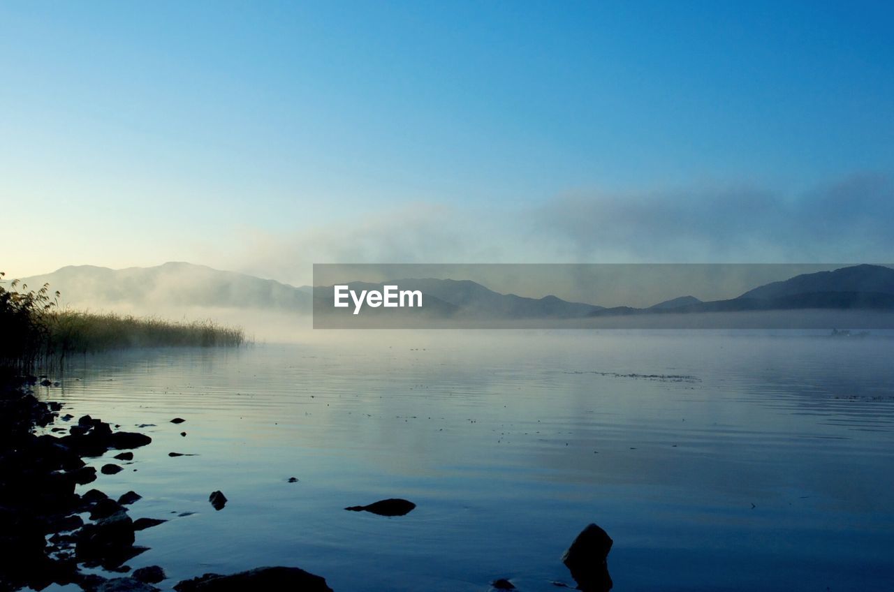 Scenic view of lake against mountains