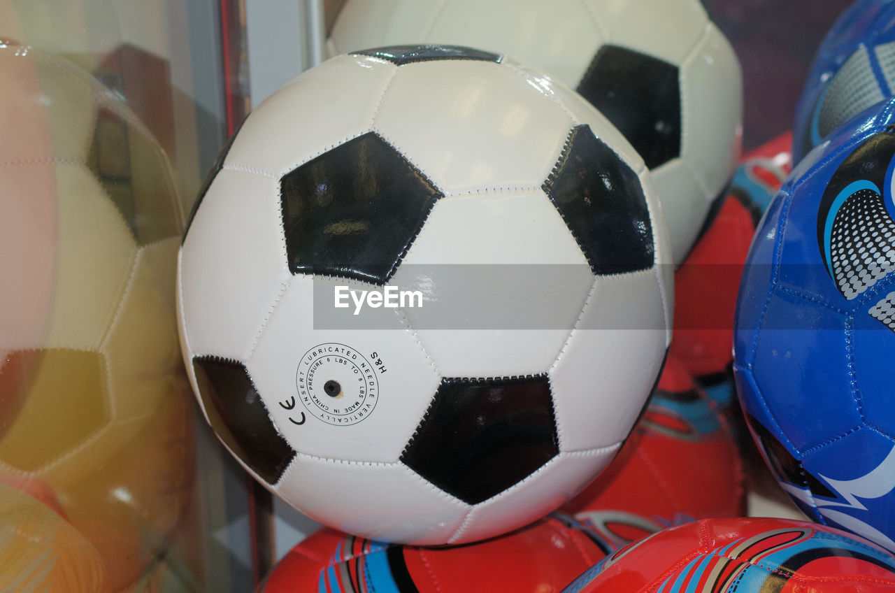 CLOSE-UP OF SOCCER BALL ON CEILING