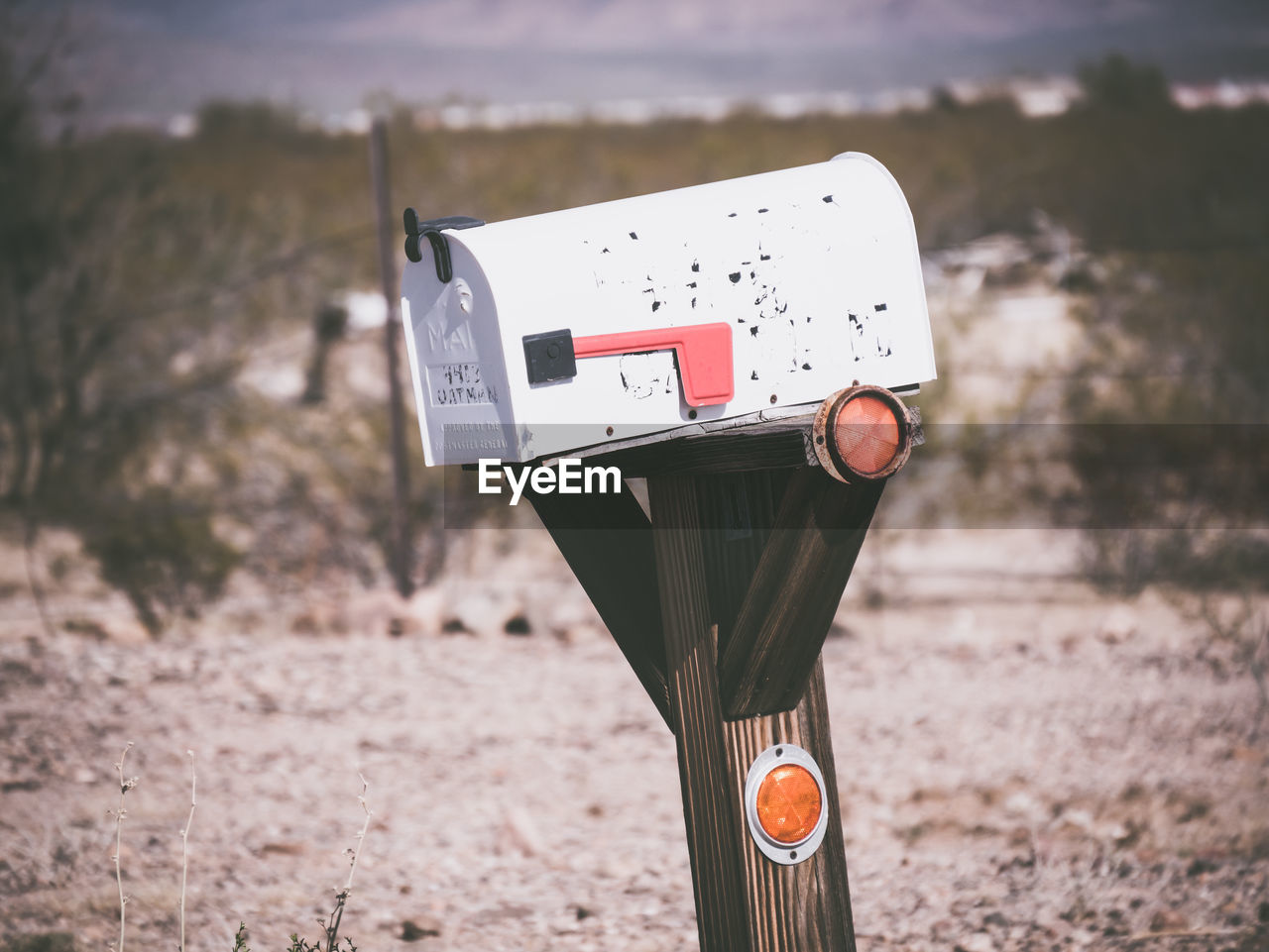 Close-up of mailbox on land