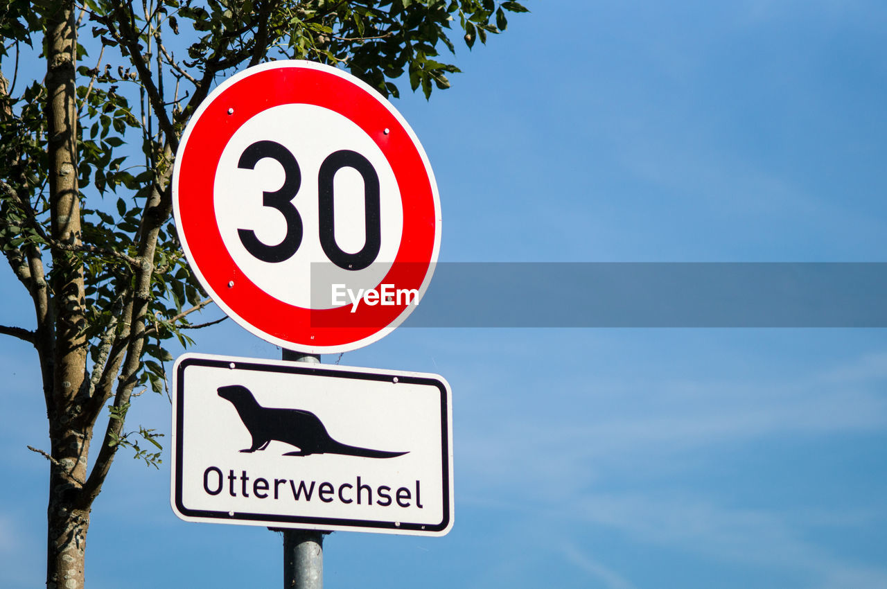 Low angle view of speed limit sign