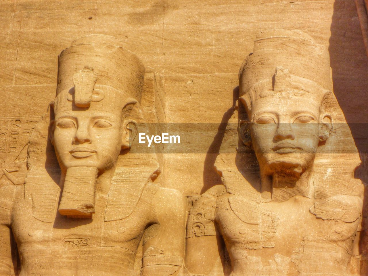 Close-up of statues at egyptian temple