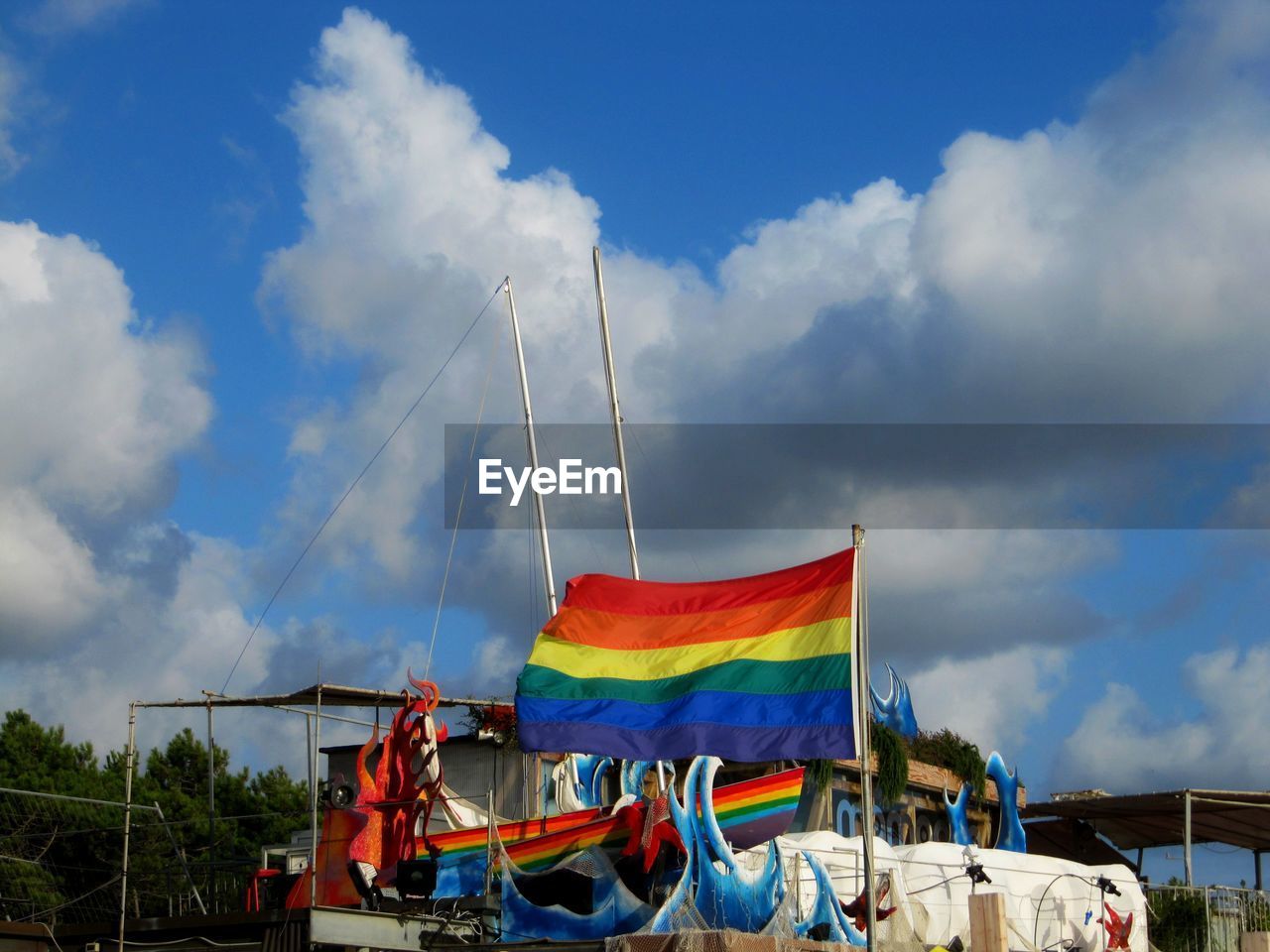 Low angle view of rainbow flag