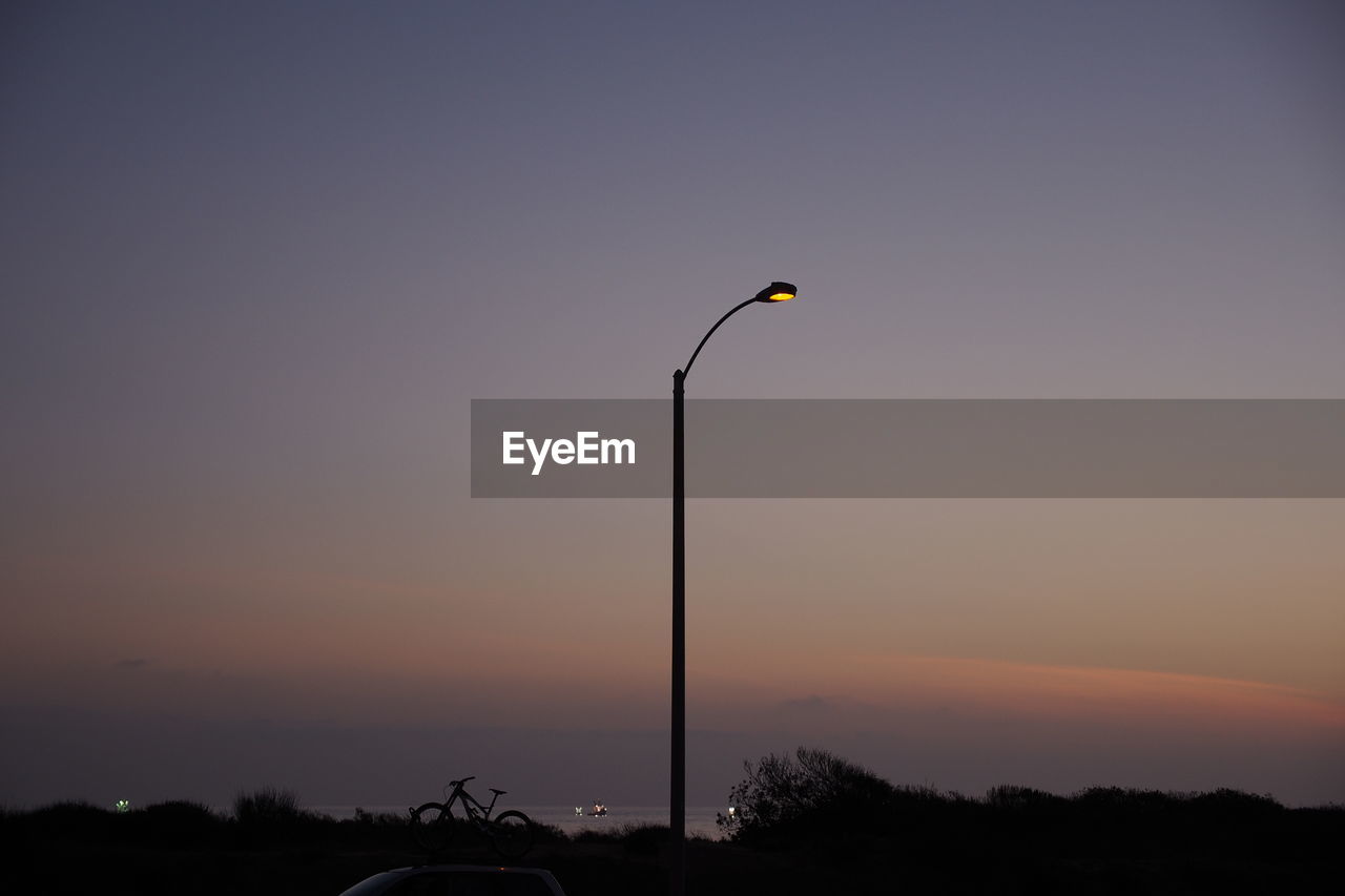 Low angle view of street light against the sky