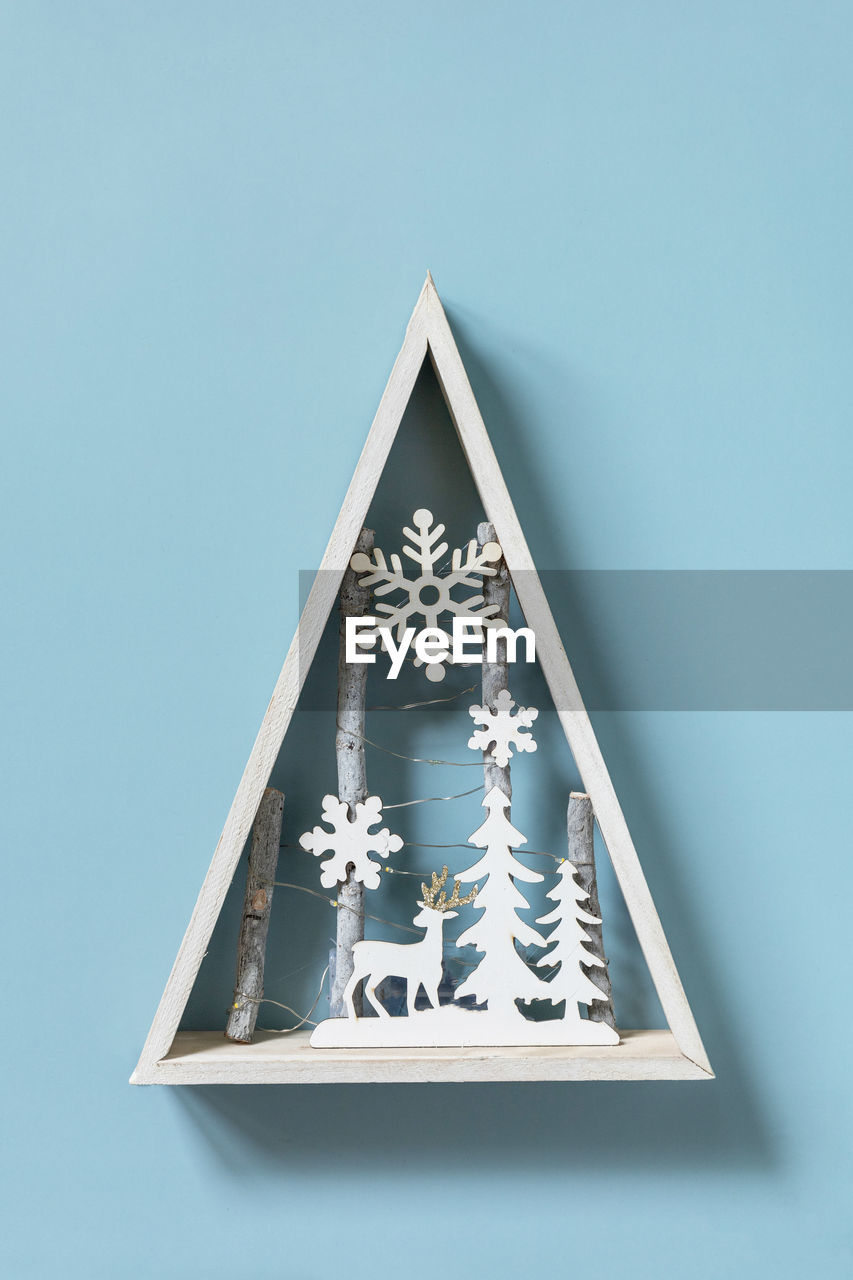 Christmas mockup with fir tree christmas decor on blue background. preparation 