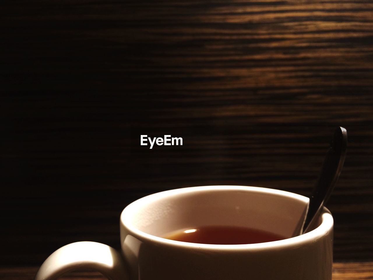 Close-up of coffee cup on table