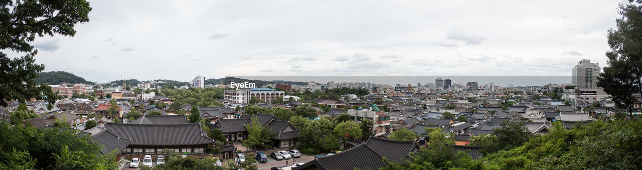 High angle shot of townscape against sky