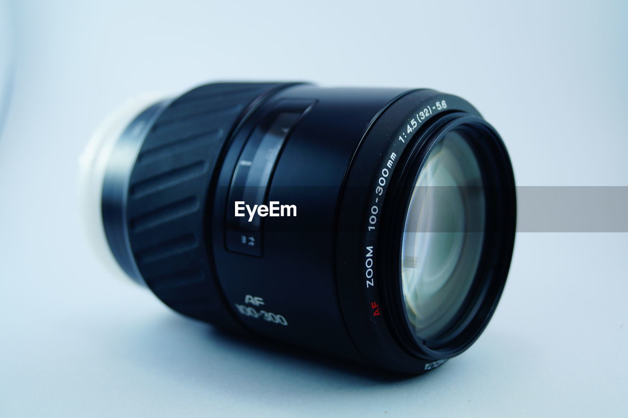 Close-up of lens over white background