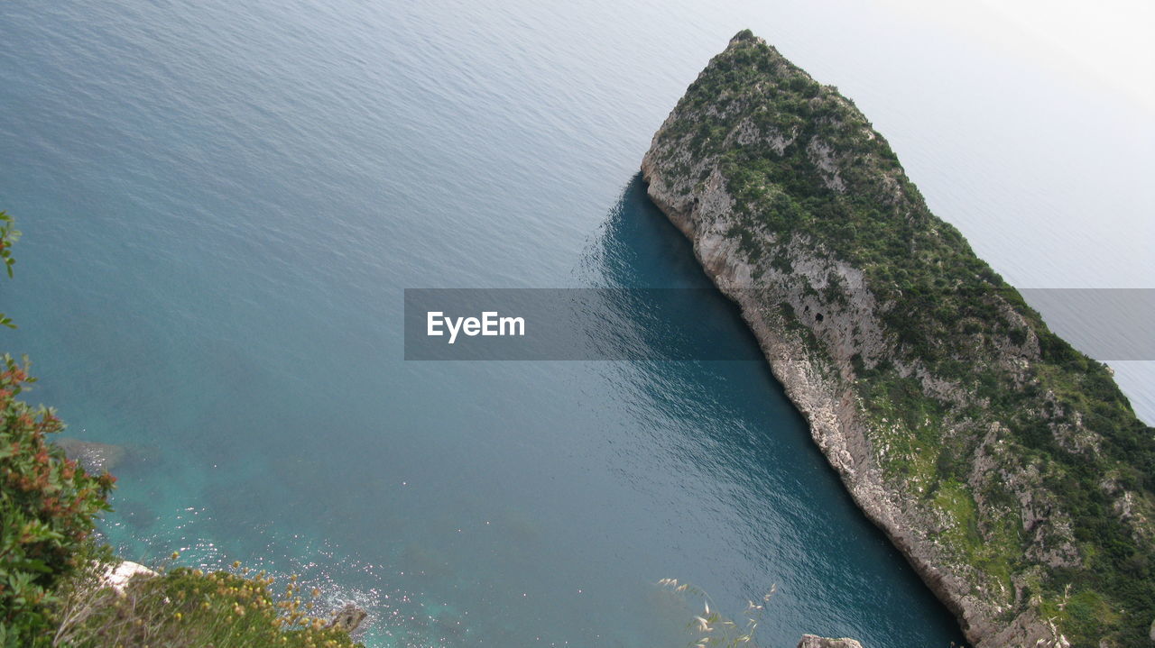 Tilt image of cliff in sea