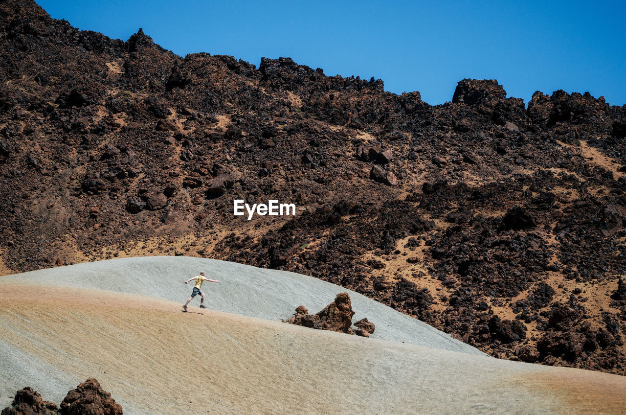 Scenic view of mountain against clear sky