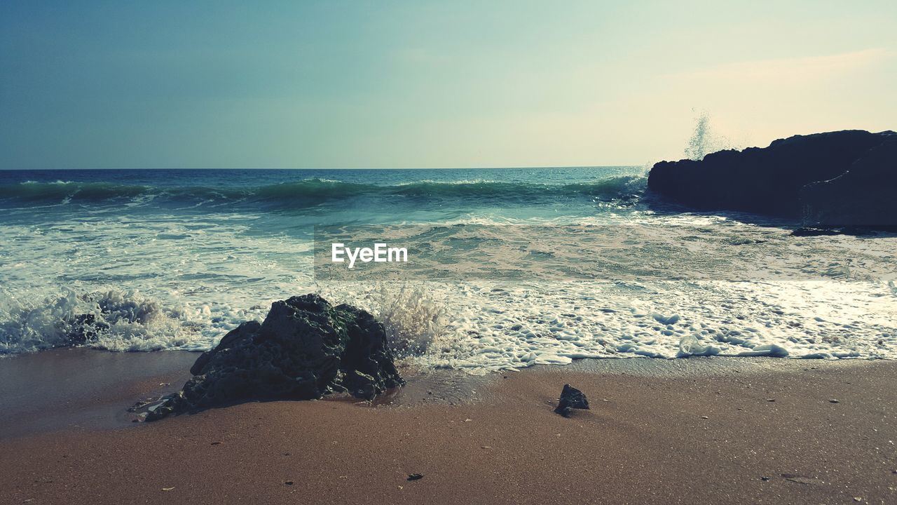 Scenic view of sea against clear sky