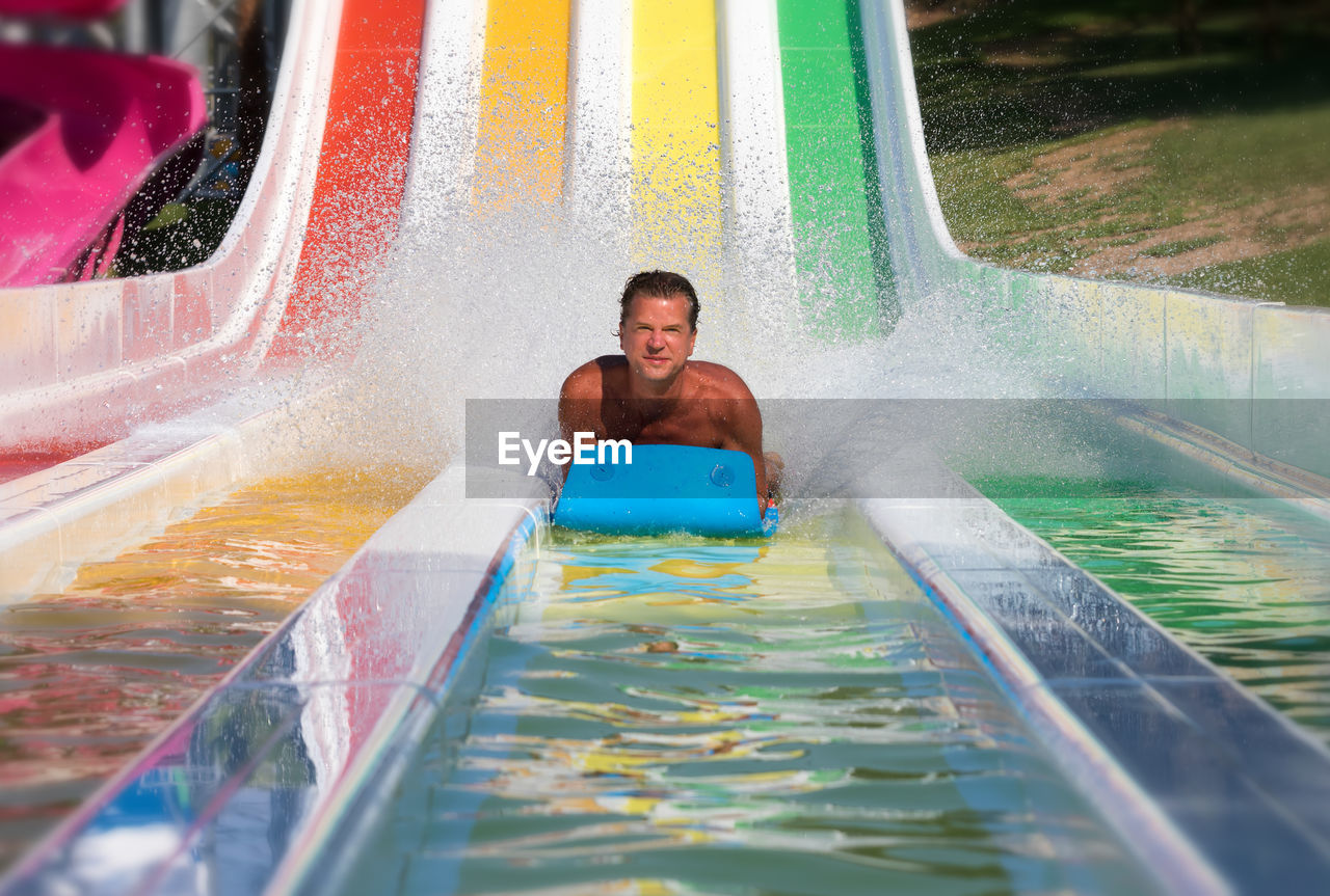 Man playing in swimming pool