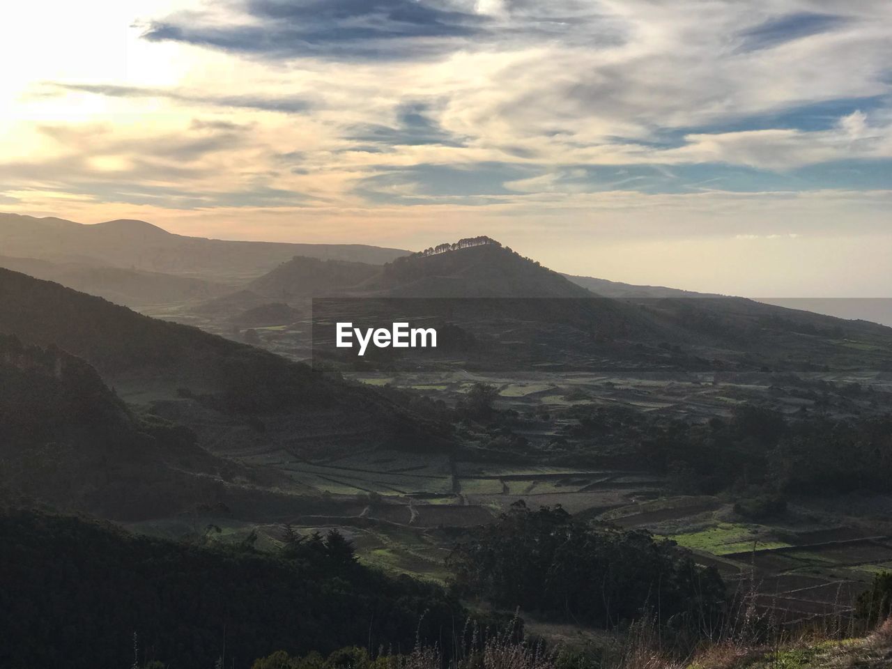 SCENIC VIEW OF LANDSCAPE AND MOUNTAINS AGAINST SKY