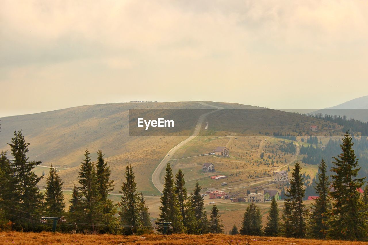 Scenic view of mountains against sky during autumn