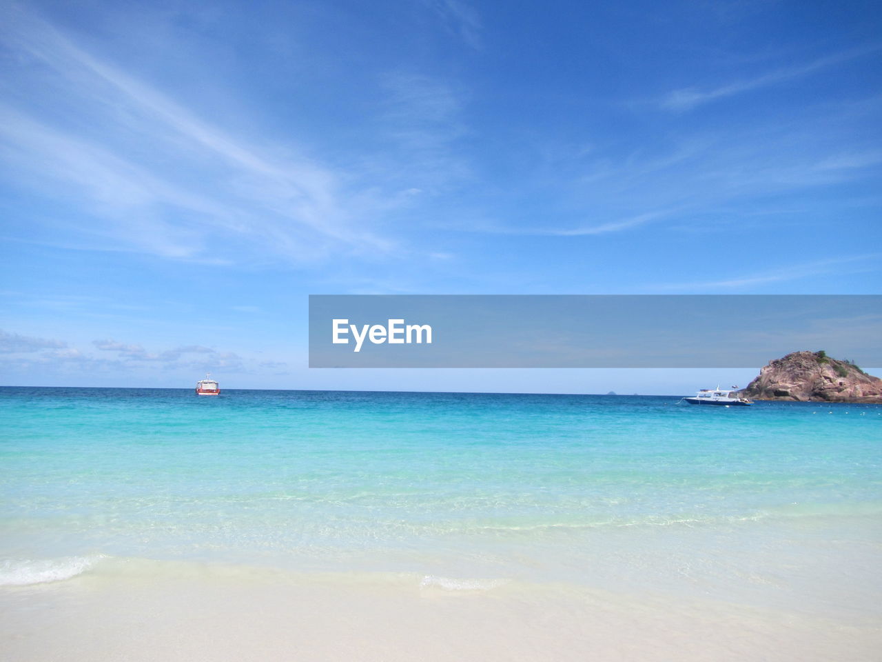 View of sea against blue sky