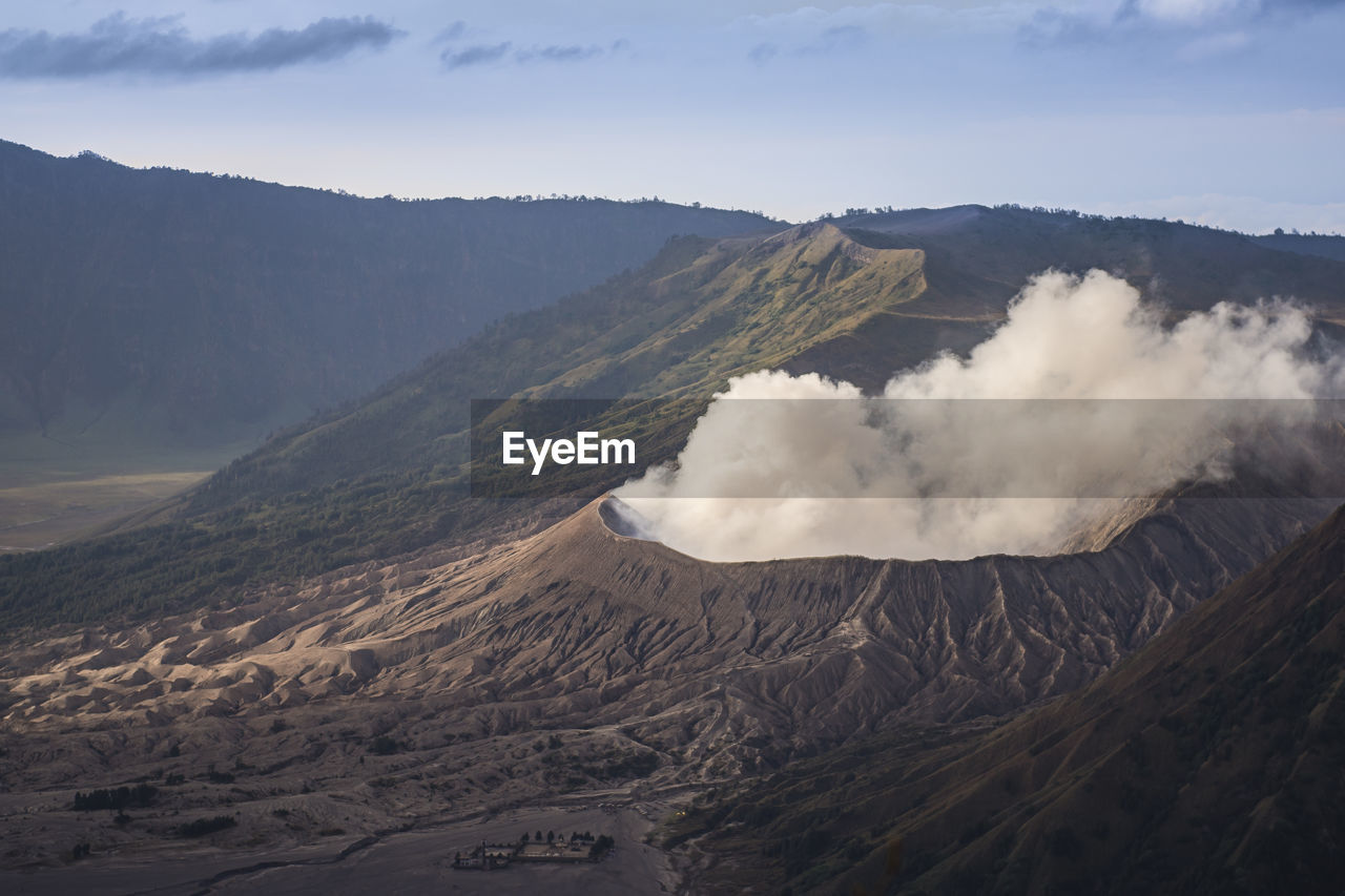 Scenic view of volcanic landscape against sky